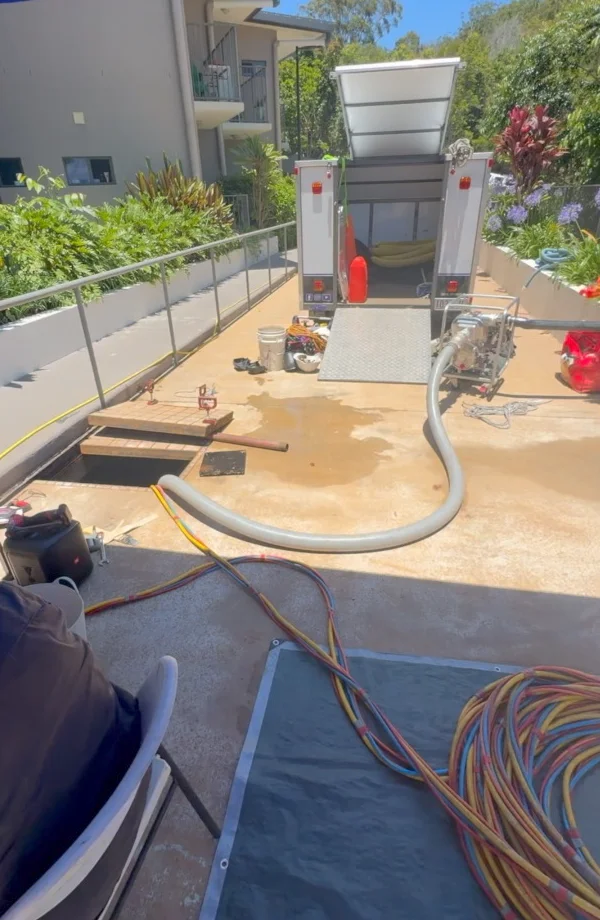 Fire Tanks Australia contamination diving equipment and service setup near an underground fire tank in a residential area.
