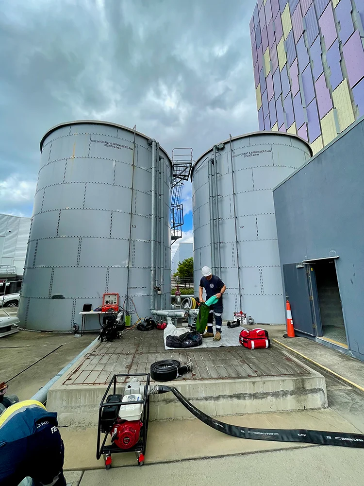 Fire Tanks Australia team preparing equipment for maintenance of industrial sprinkler and hydrant tanks.